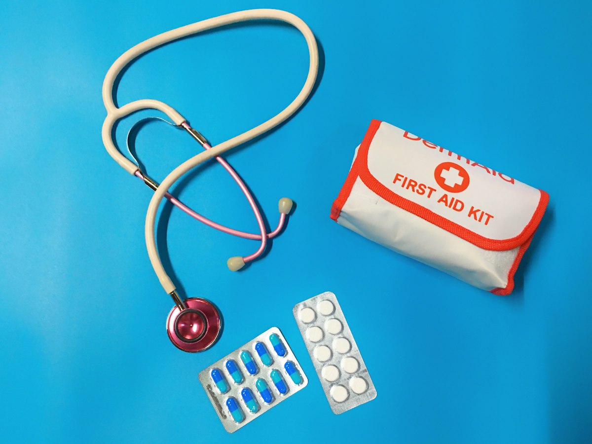 Medications, a stethoscope and a first aid kit